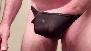 Jerking cock in black thong