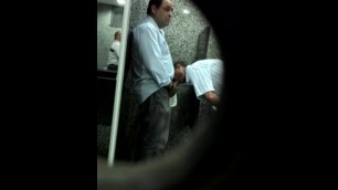 2 Guys Caught in the Act in Public Restroom