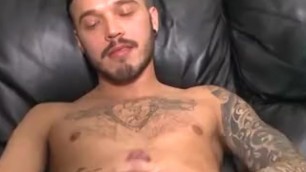 Tattooed Young Guy Vigorously Strokes His Big Dick for Daddygay